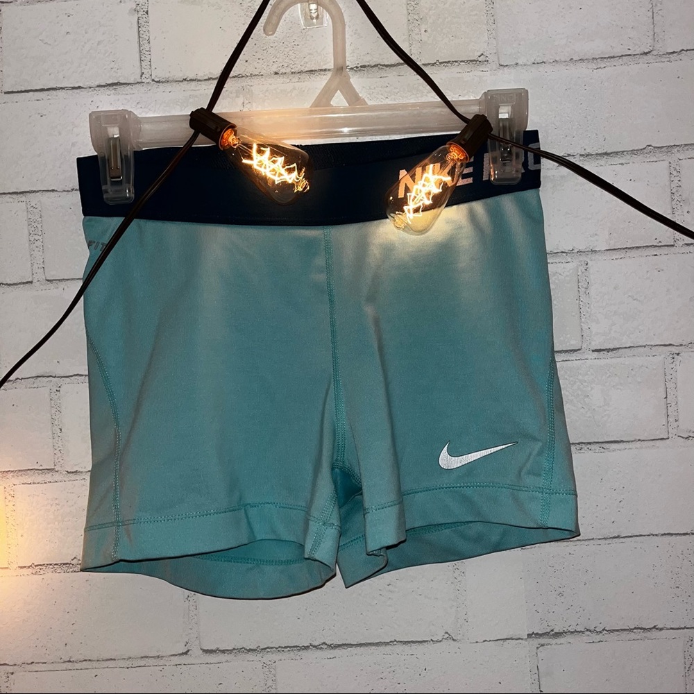 Blue Nike pro shorts
